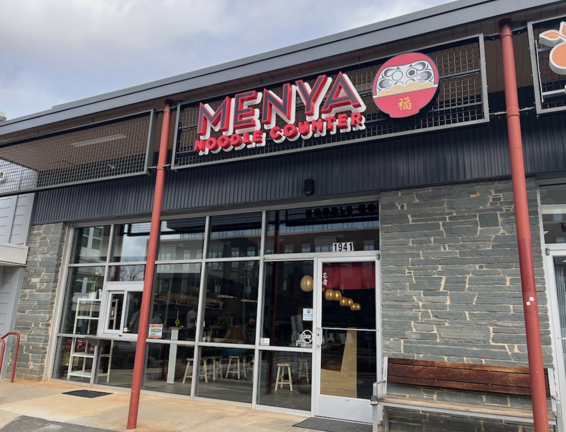 exterior photo of Menya Daruma Noodle Counter at Shops on 7th Charlotte, NC